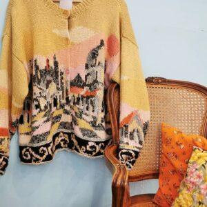 best vintage shops and thrift stores in the south of france in montpellier: Champin Boutique vintage knitted orange cardigan