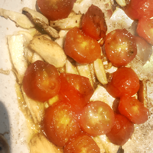 grilling cherry tomatoes and garlic for Brussels Sprouts 
